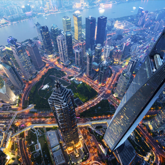 Wide angle view of the waterfront Lujiazui Financial District at night.