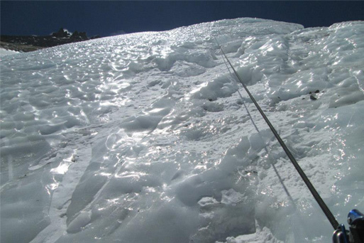 Horacio scaling a wall of ice