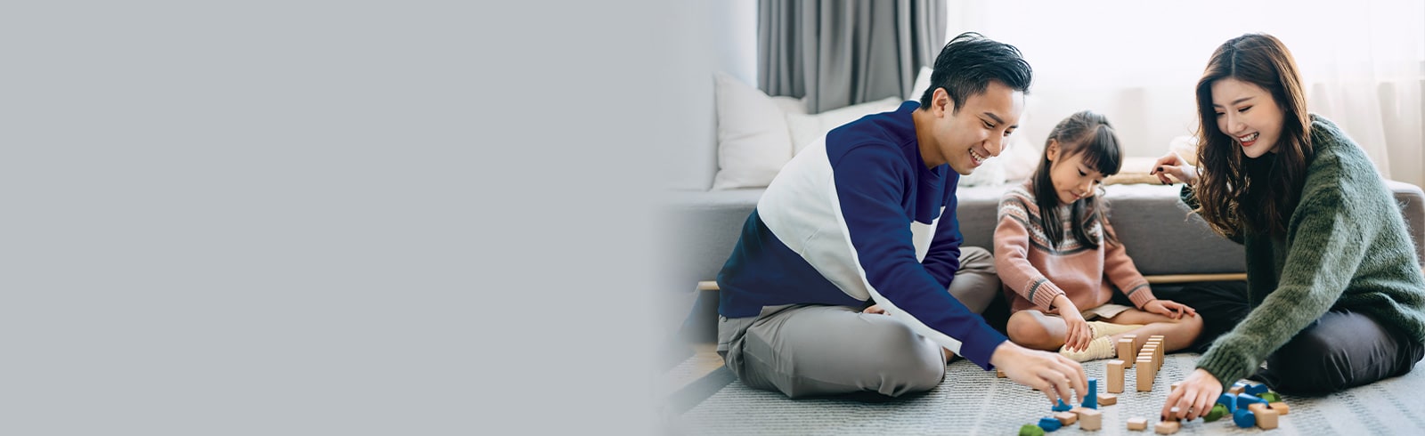 A family is playing Jenga