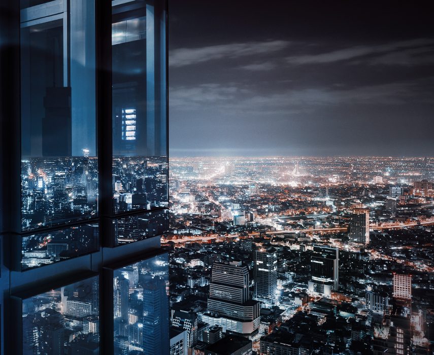 High rise building in city at night
