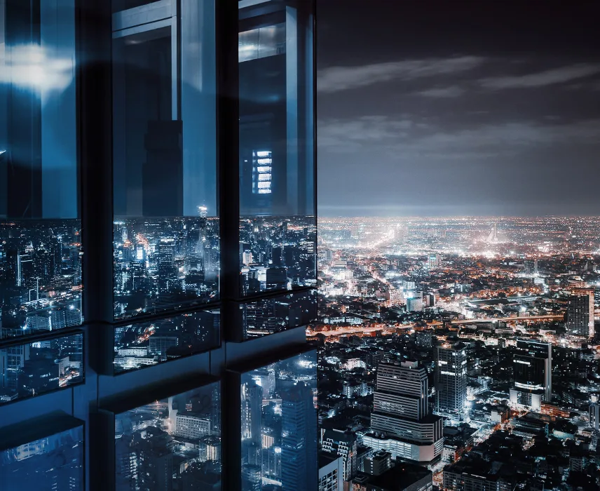 High rise building in city at night