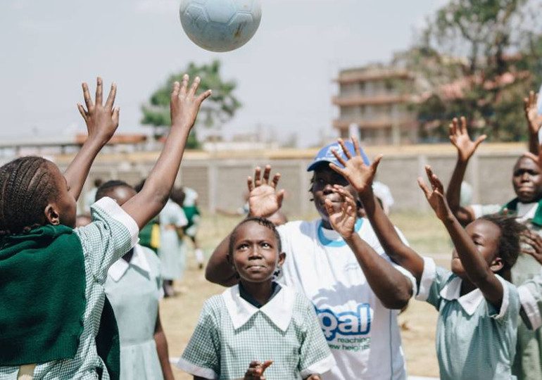 children playing football