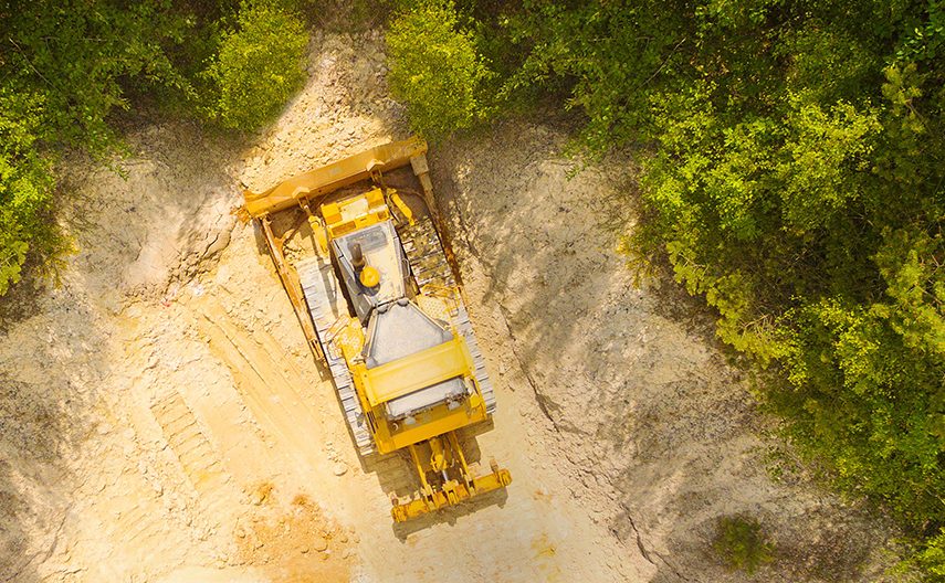 A vehicle moves stone in a quarry.