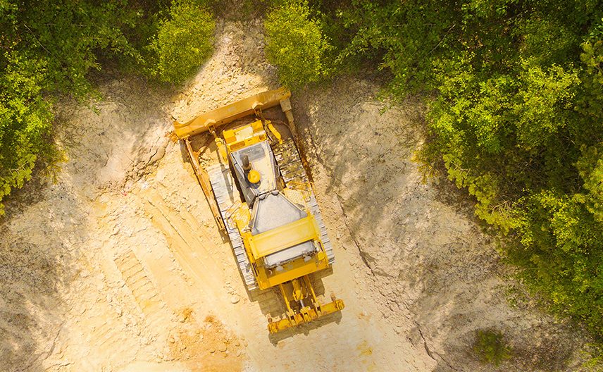 A vehicle moves stone in a quarry.