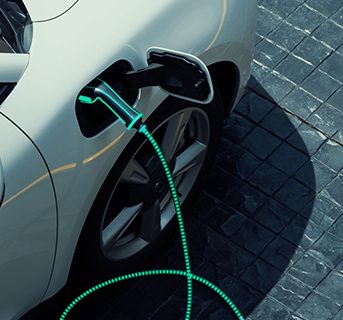 A charging electric vehicle.