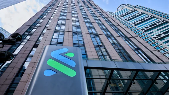 A trustmark outside a Standard Chartered office.