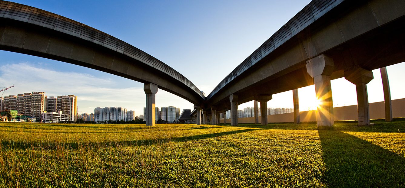 Two highways intersecting against the backdrop of bright sunshine