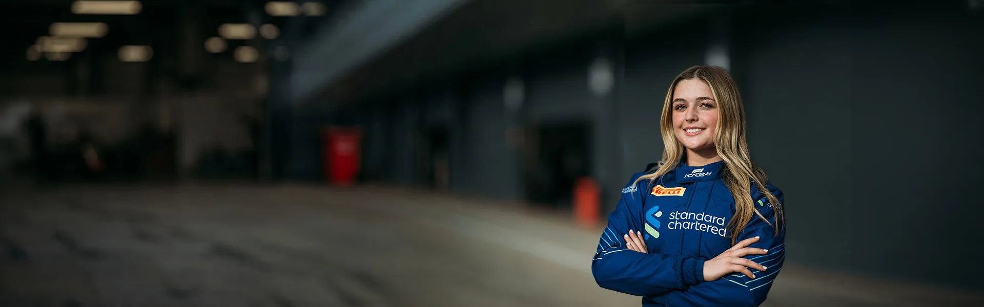 F1 ACADEMY Wild Card driver Autumn Fisher in her Standard Chartered race suit.
