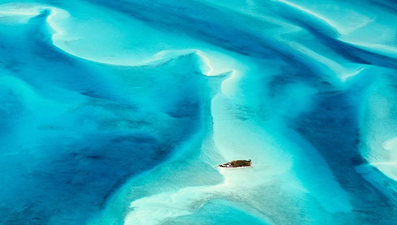 A beach with a boat.