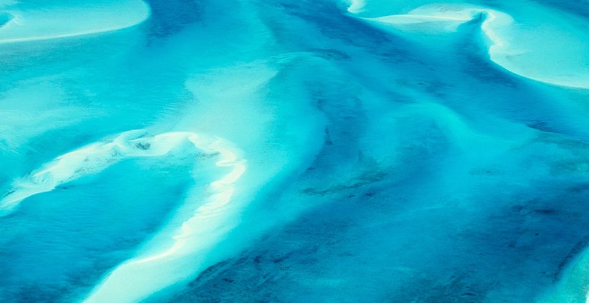 A beach with a boat.