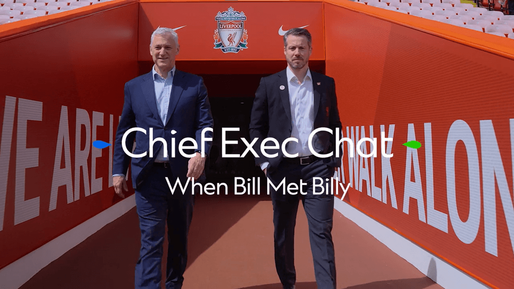 Bill and Billy walk out on to the iconic Anfield pitch.