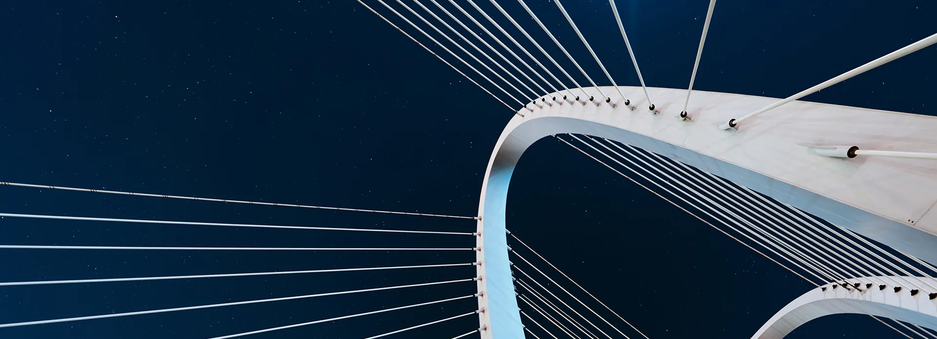 Modern bridge against starfield
