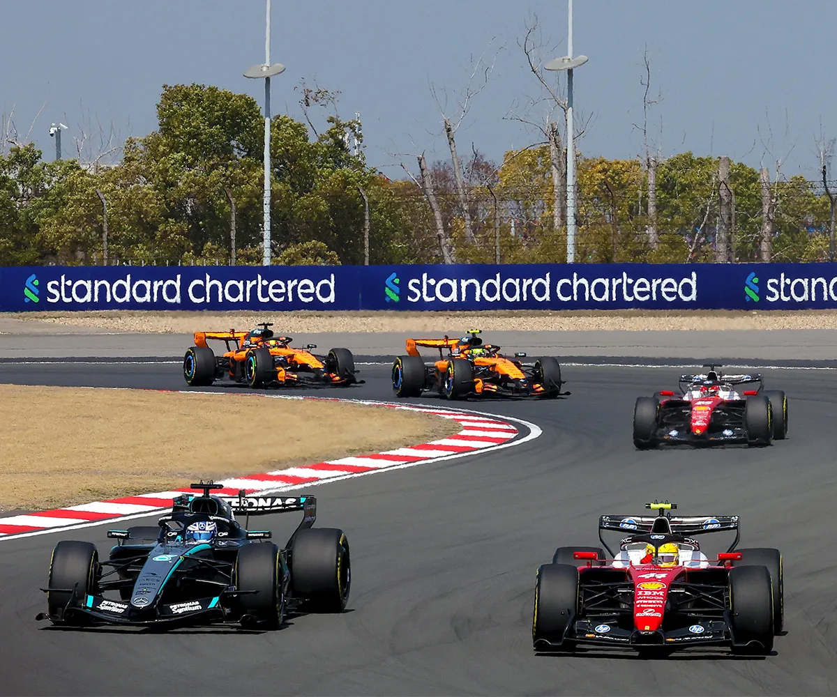 Standard Chartered branding trackside at a race.