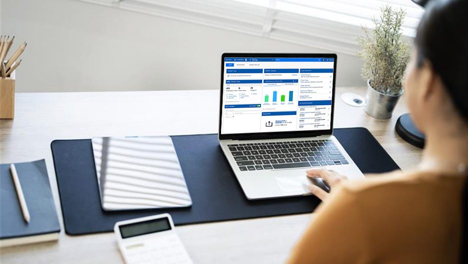 A woman working on a laptop