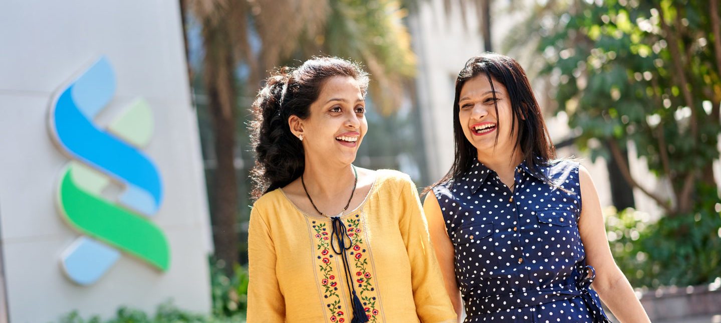 2 women talking outside