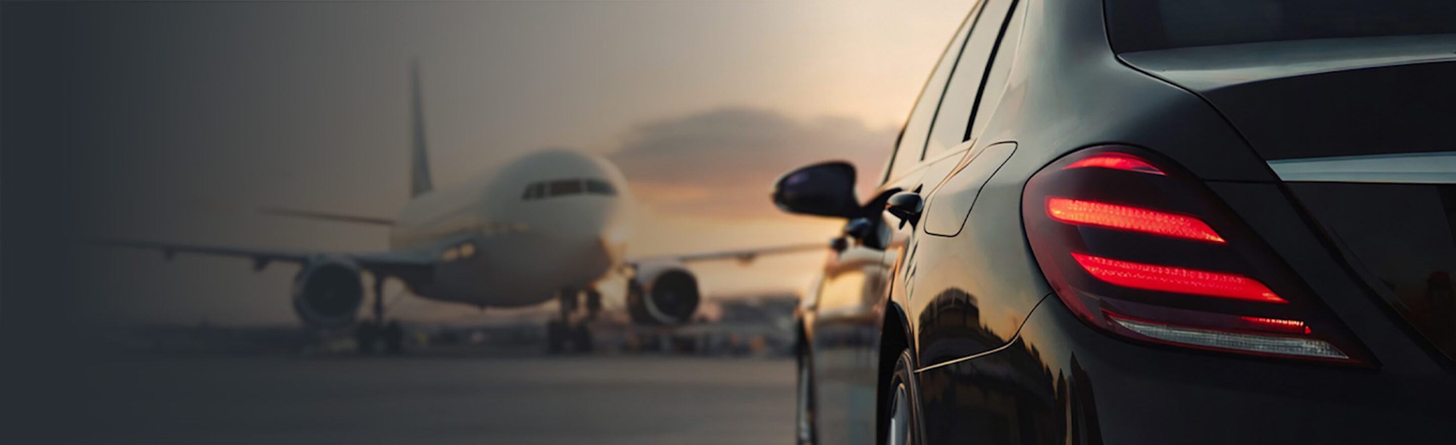 A limousine waits on the tarmac to transfer a Standard Chartered Private Bank client at an airport.