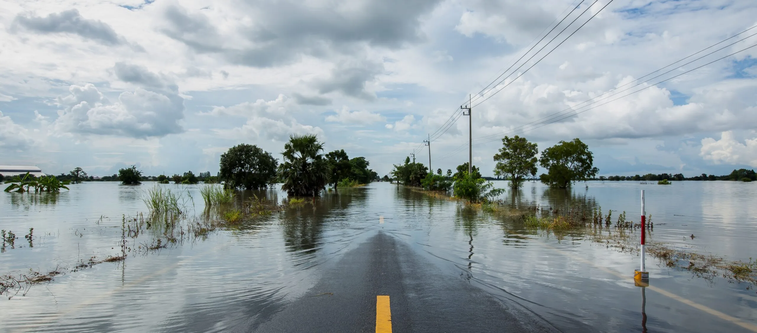 Flood water on either sides of the road