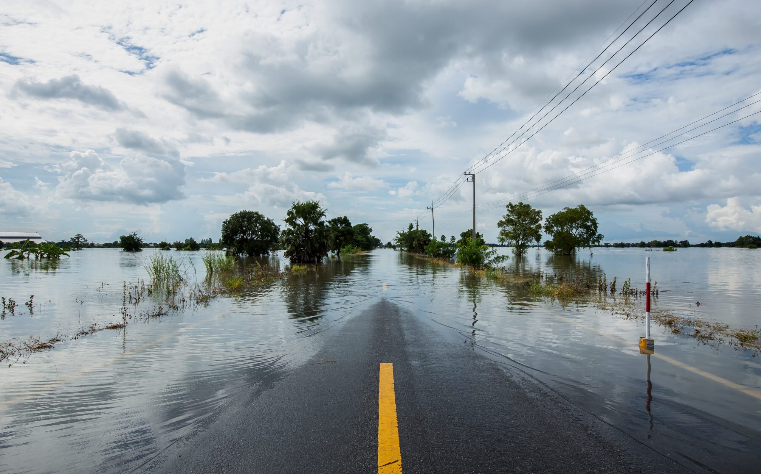 Flood water on either sides of the road