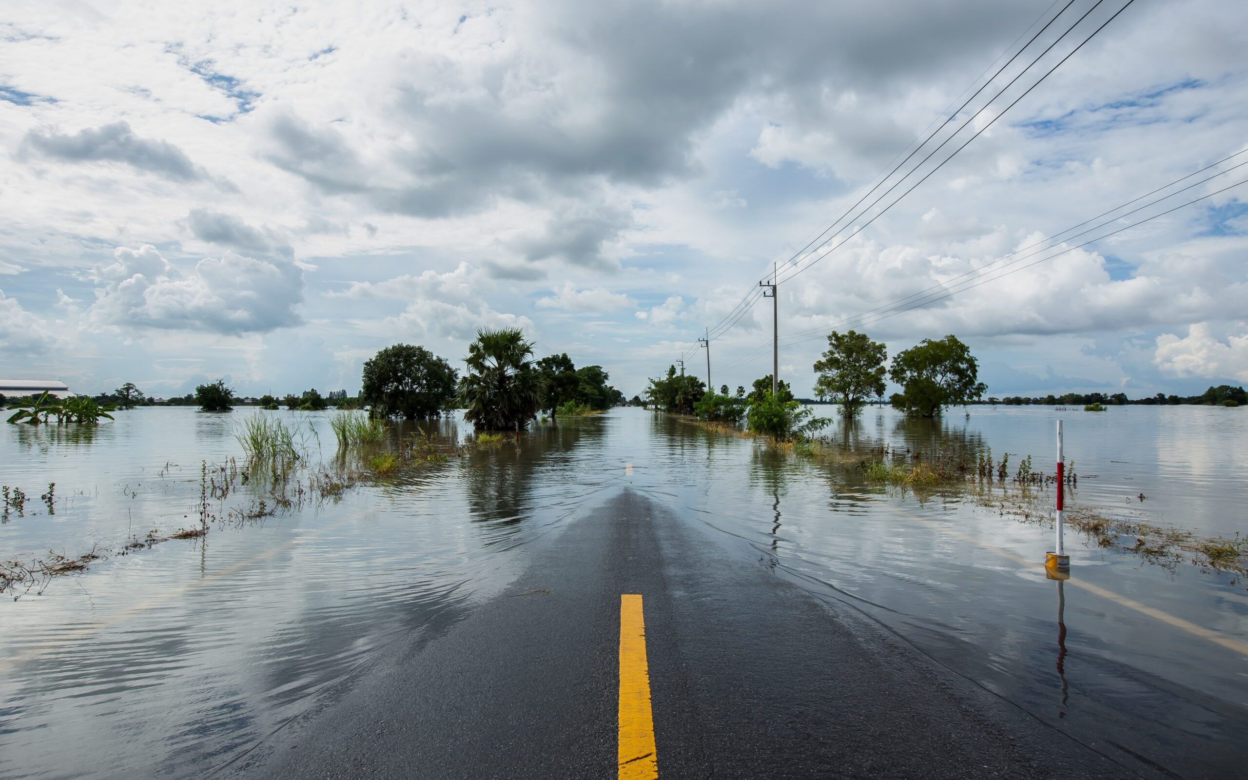 Flood water on either sides of the road