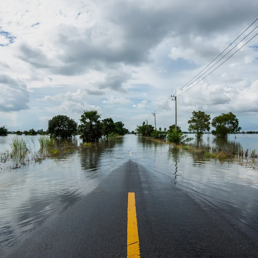Flood water on either sides of the road