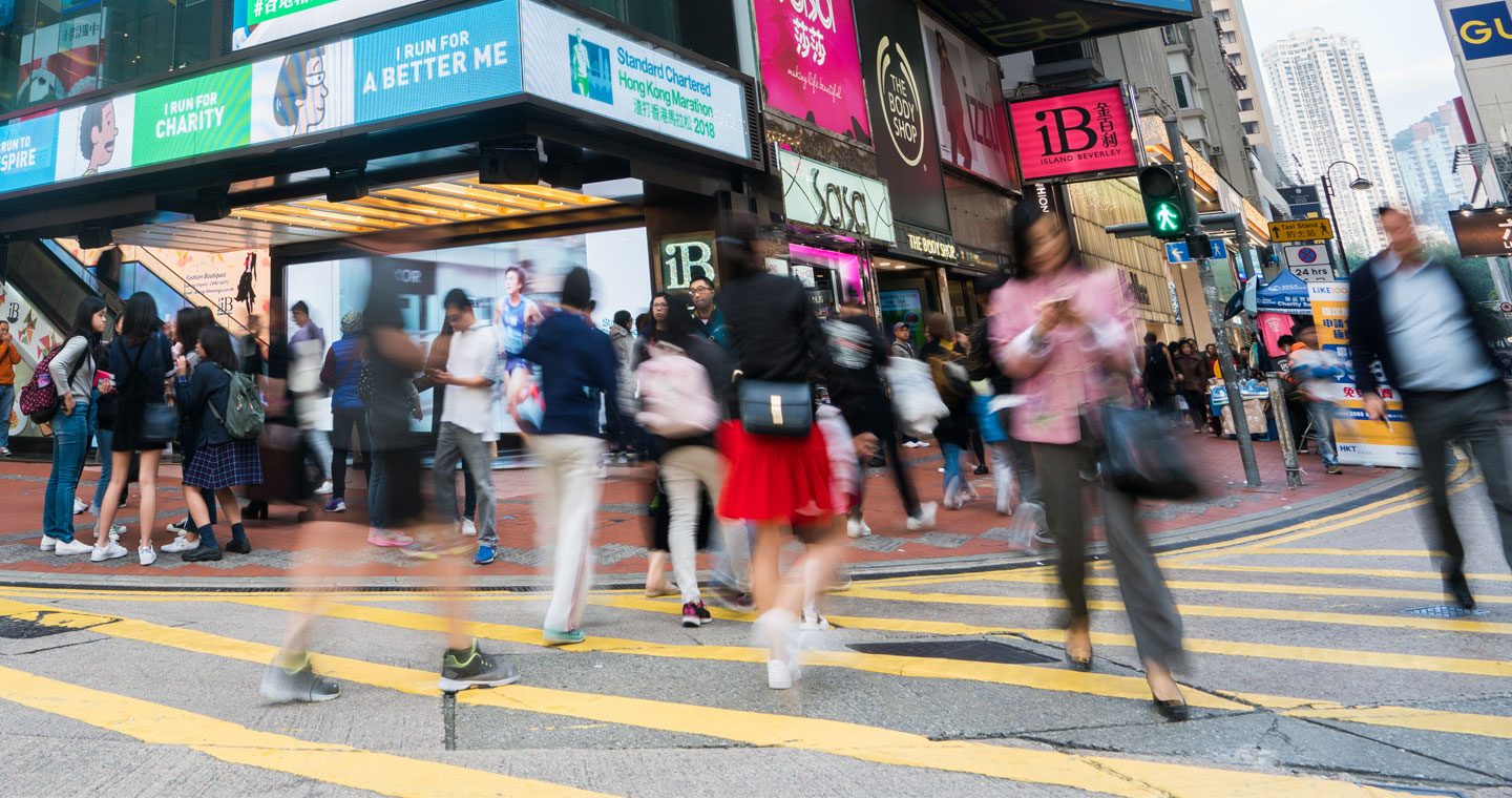 people walking on busy high street