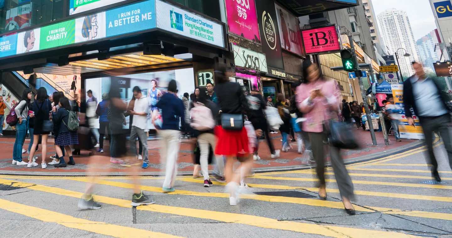 people walking on busy high street