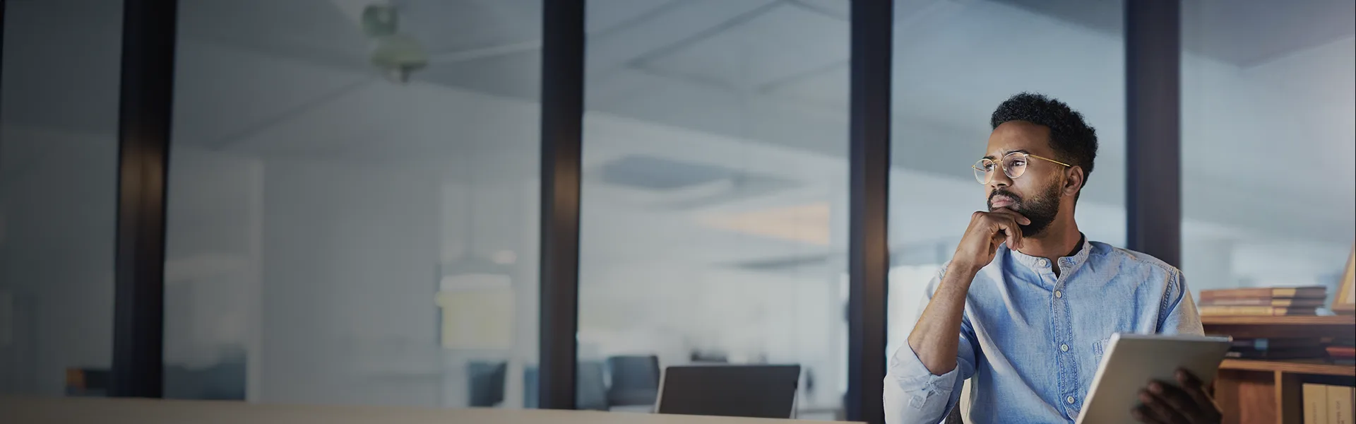 A colleague contemplates AI at Standard Chartered.