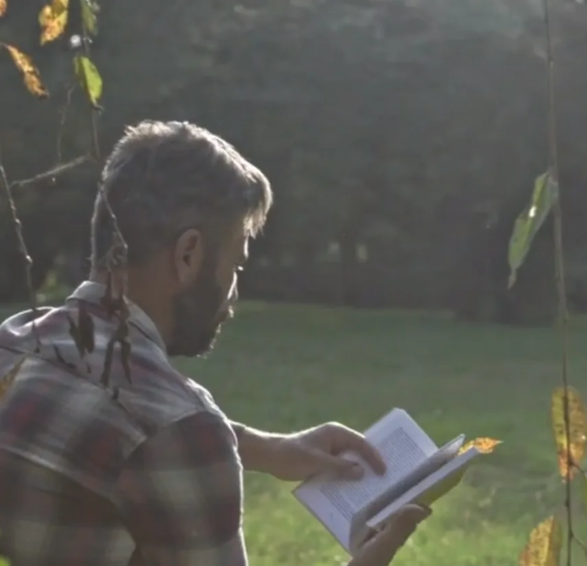 man reading a book