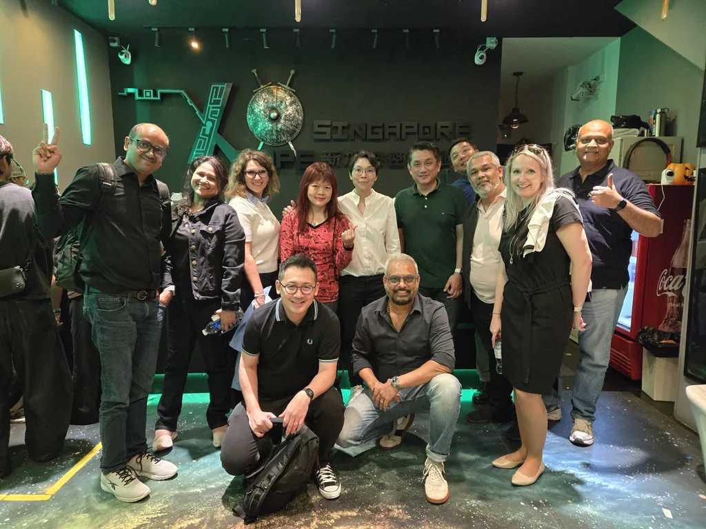 A group shot featuring Felicia Ong alongside her team.