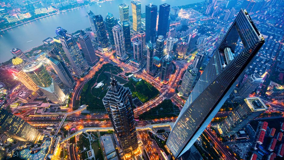 Wide angle view of the waterfront Lujiazui Financial District at night.