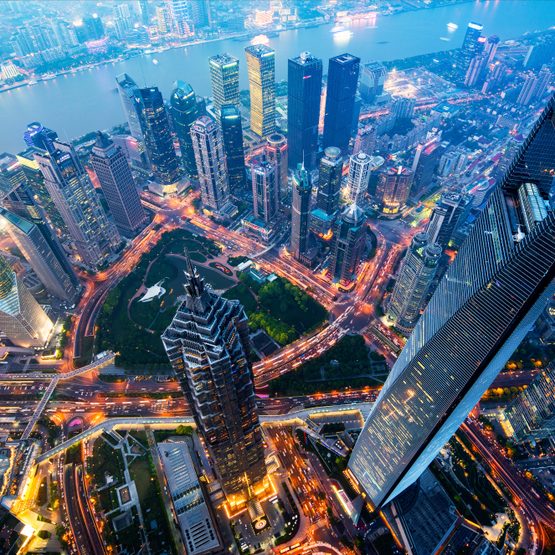 Wide angle view of the waterfront Lujiazui Financial District at night.