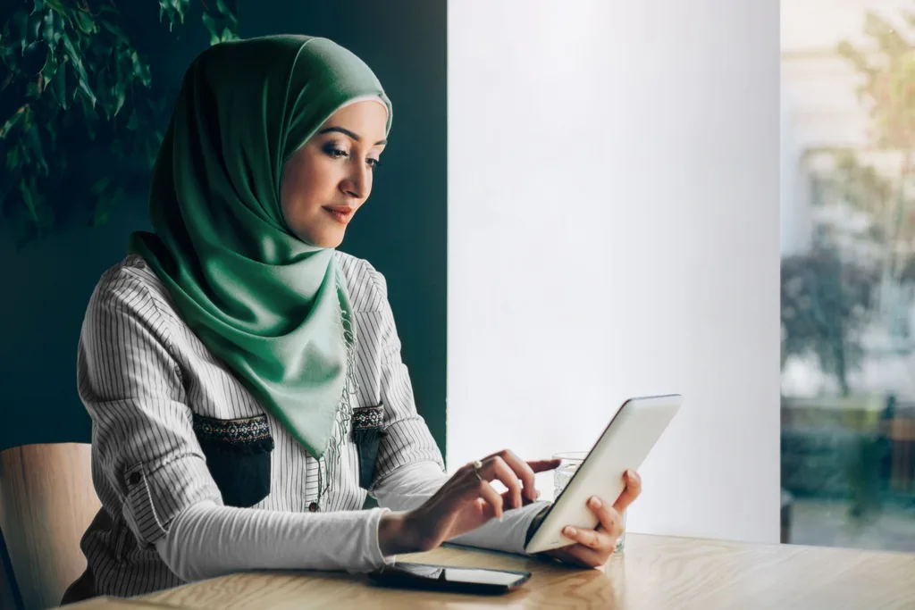 Affluent middle east woman with tablet