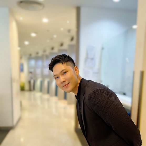 A portrait of Lam Nguyen The