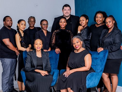 The staff of Luzuko hospitality pose for a group pic.