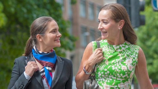 2 women talking outside