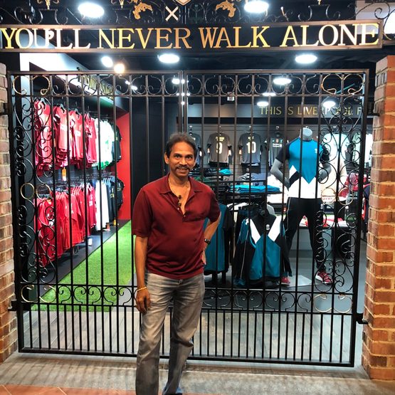 Rajen at an LFC store
