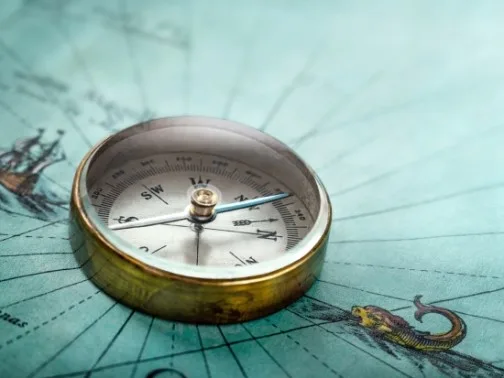 Magnetic compass on a map