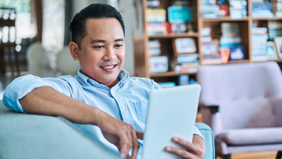 man with tablet
