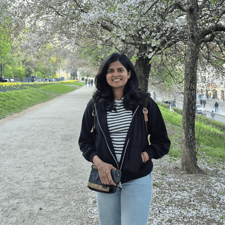 Sakthya standing in a park