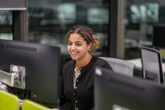 Employee looking at her computer