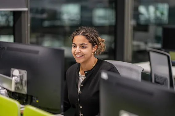 Employee looking at her computer