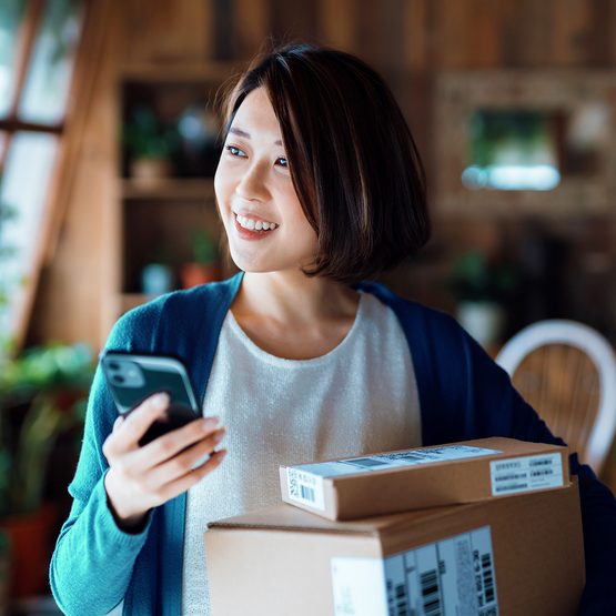 small business owner with parcels