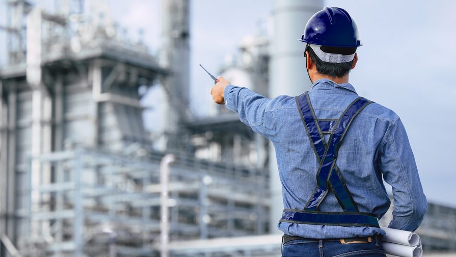 Civil engineering working in an industry