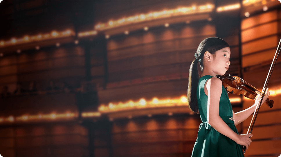 Yeonah Kim prepares to play live on stage in the 'Now is your time' video.