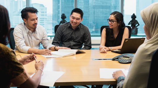 Some of our corporate finance team in a meeting