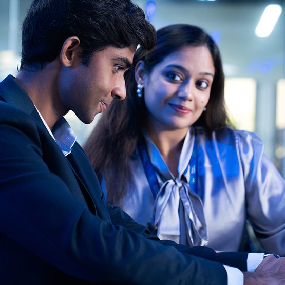 two colleagues work together