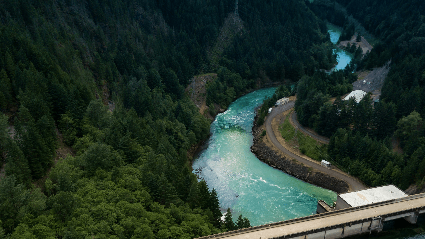 A river flows under a bridge.