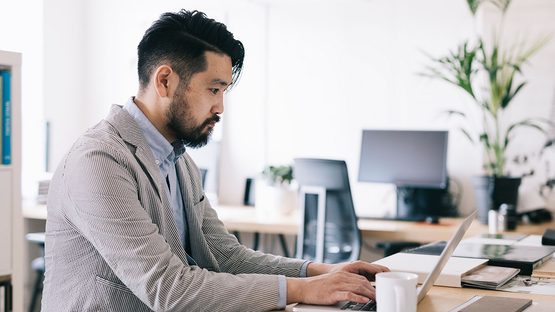 man using laptop