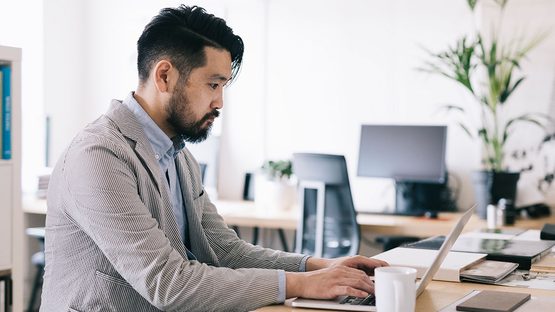 man using laptop