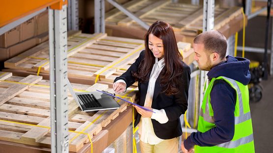 people in warehouse stocktaking